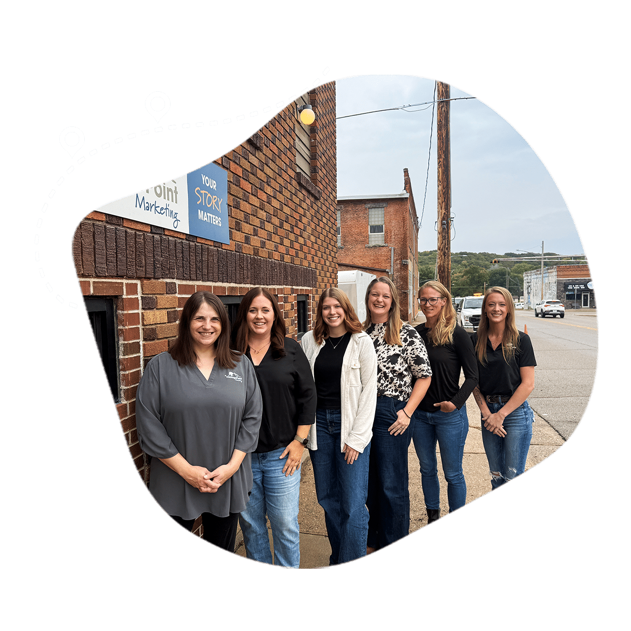vantage point team photo outside the building cutout
