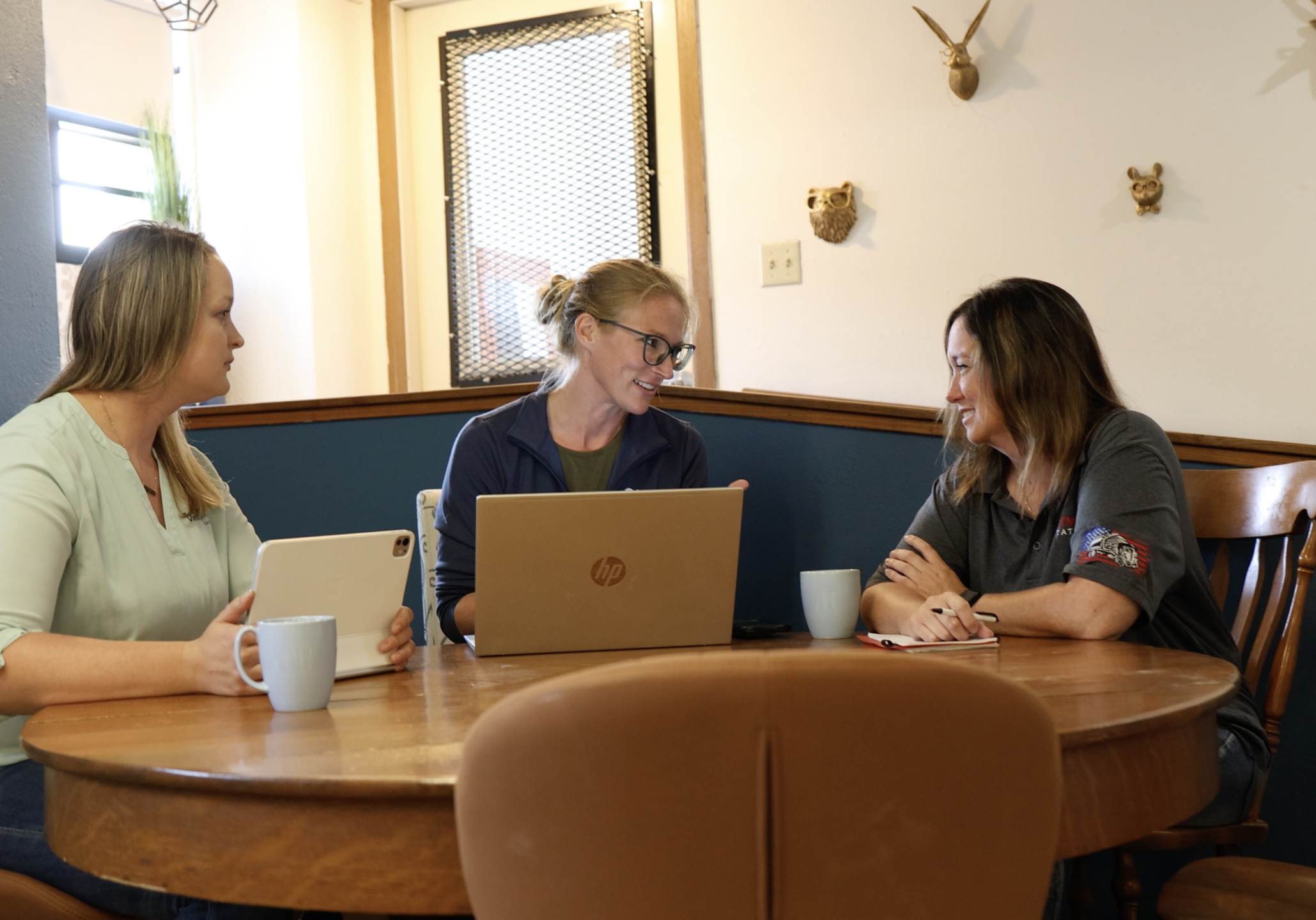 vanatgepoint team with client at a table