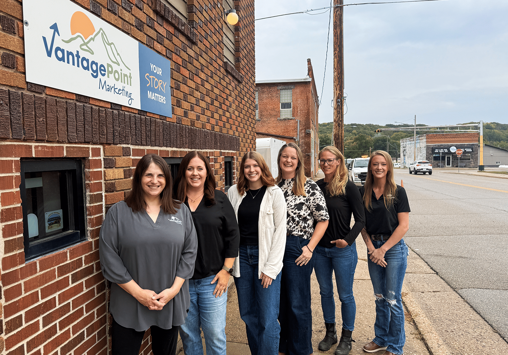 vantage point team photo outside the building
